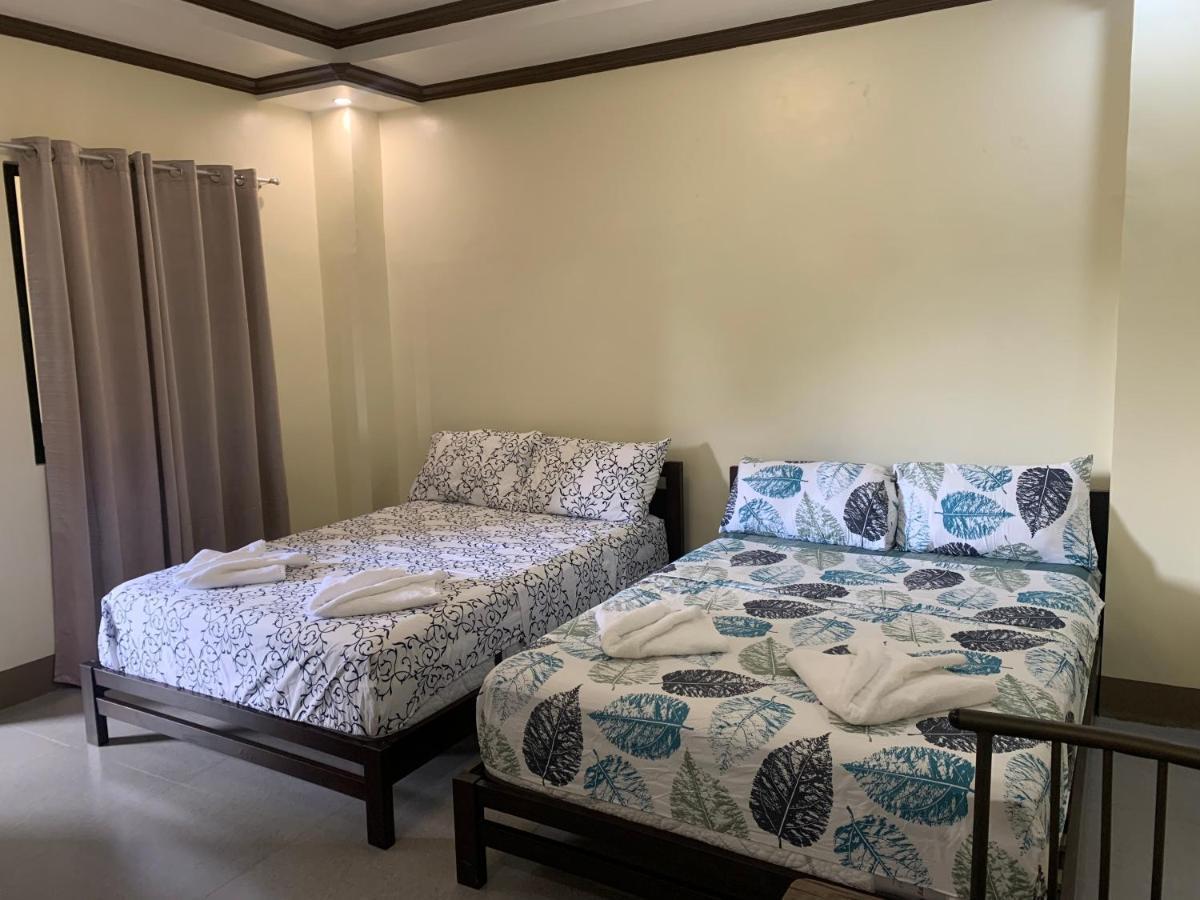 Zl Travelers Inn Batuan Exterior foto