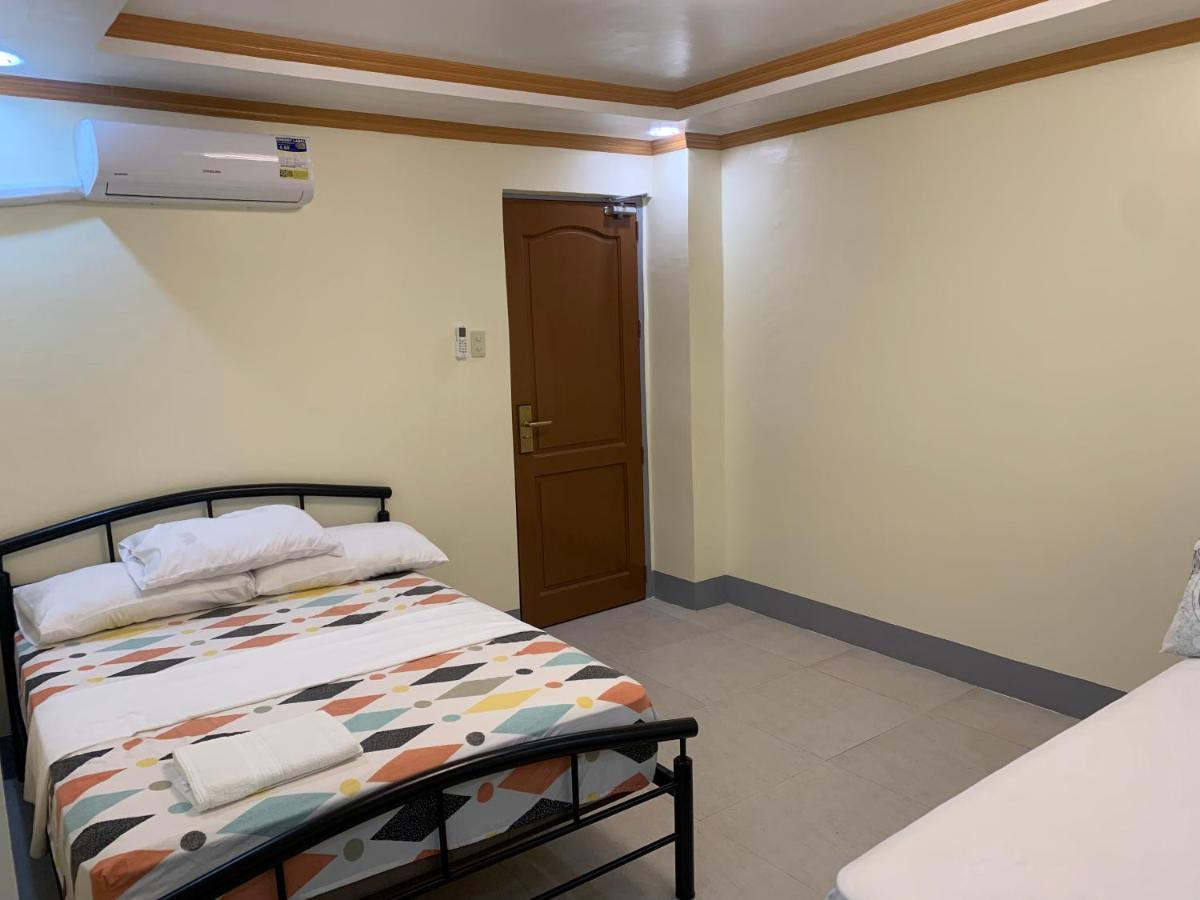 Zl Travelers Inn Batuan Exterior foto